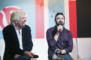 Richard Branson speaks to Virgin Mobile's Joseph Ottorino on stage at the Virgin Mobile Mod Club in Toronto