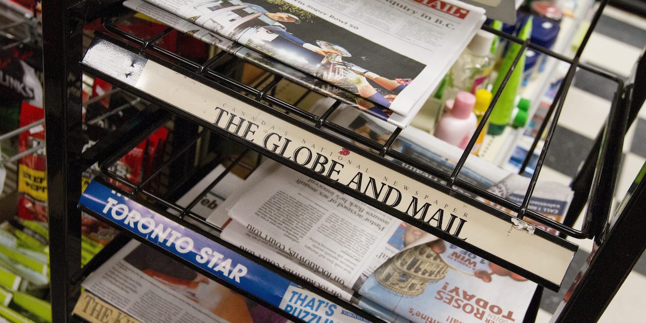 Newspapers for sale at a convenience store at Queen's University, Kingston, Ont., Feb. 8, 2016. THE CANADIAN PRESS IMAGES/Lars Hagberg