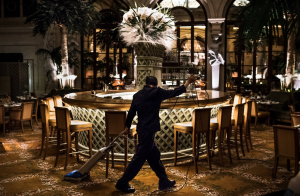 Lau Chun-Tai cleans the Palm Court. He has been doing custodial work on the night shift at the Plaza for 8 years.