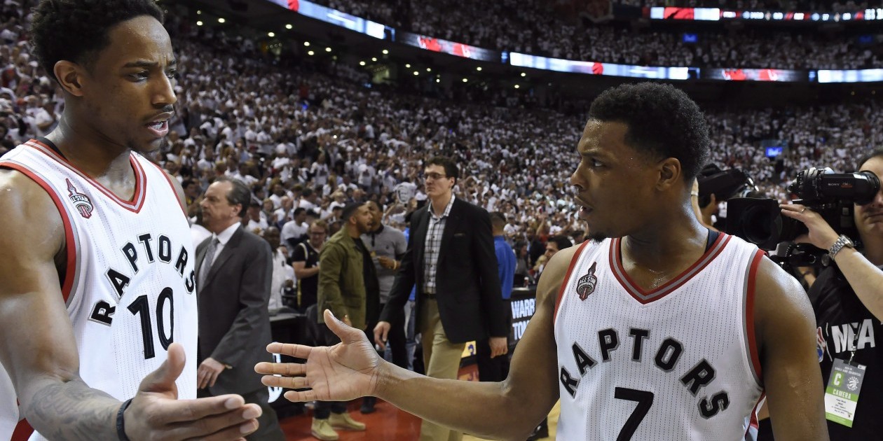 Toronto Raptors' DeMar DeRozan and teammate Kyle Lowry (7) celebrate winning game four over the Cleveland Cavaliers in Eastern Conference final NBA playoff basketball action in Toronto on Monday, May 23, 2016. THE CANADIAN PRESS/Frank Gunn