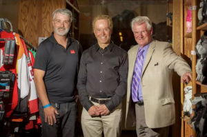 Russell Gillespie, General Manager, Comrie’s Sports Equipment Bank; Bill Comrie; Al Coates, Chairman, Comrie’s Sports Equipment Bank.