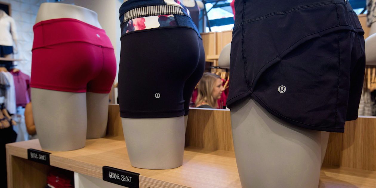 Women's shorts are displayed on mannequins as a woman shops at Lululemon Athletica's new flagship store on Robson Street during its grand opening in downtown Vancouver, B.C., on Thursday August 21, 2014. Lululemon Athletica Inc.says its first quarter revenue was up more than expected and it's raising the bar for its 2015 full-year results.THE CANADIAN PRESS/Darryl Dyck